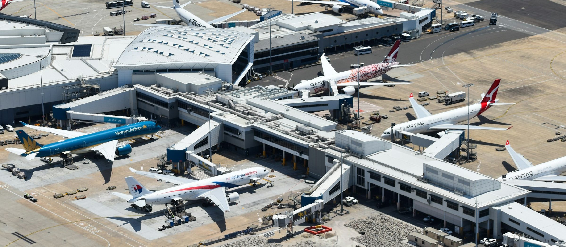 Commercial aircraft of different airlines at an international airport